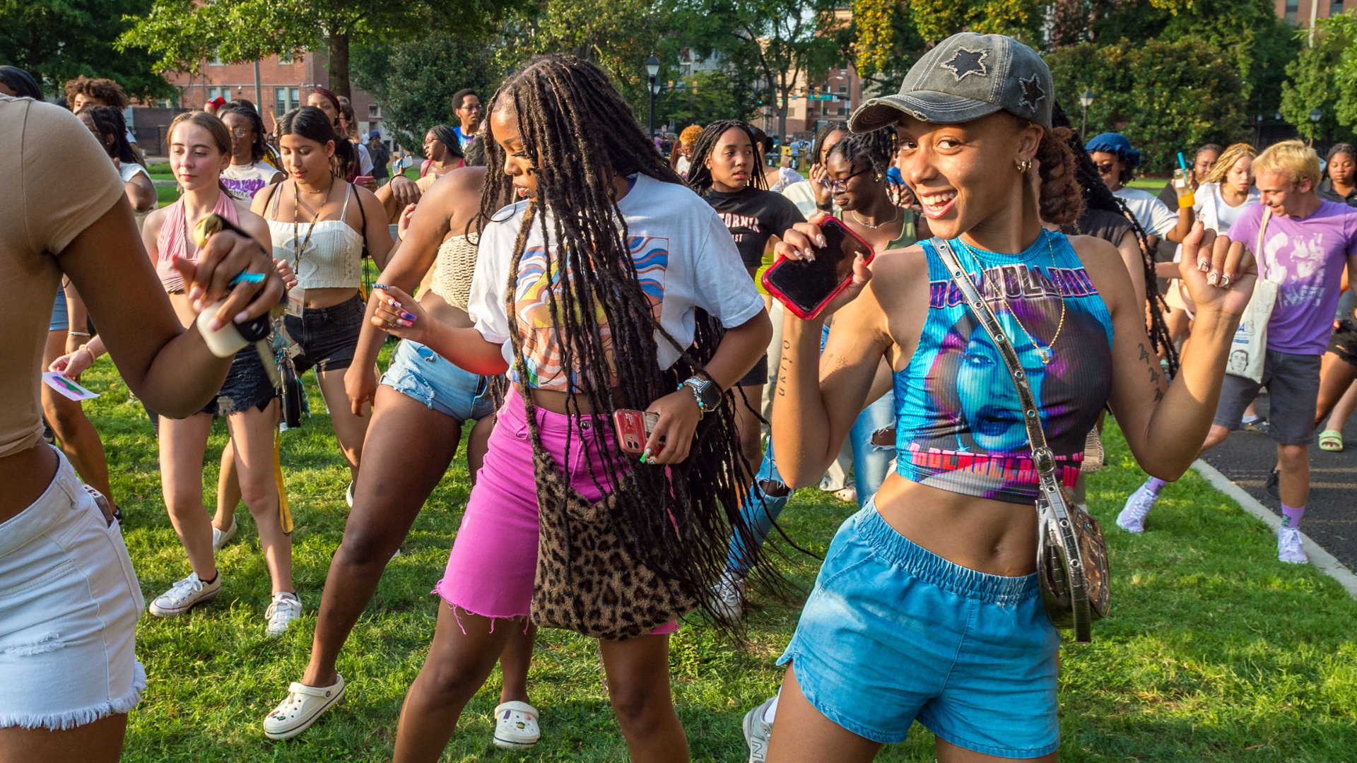 Students dancing in Monroe Park