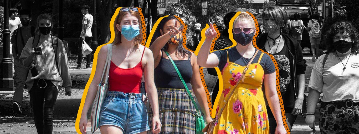 group of students tour campus while wearing masks